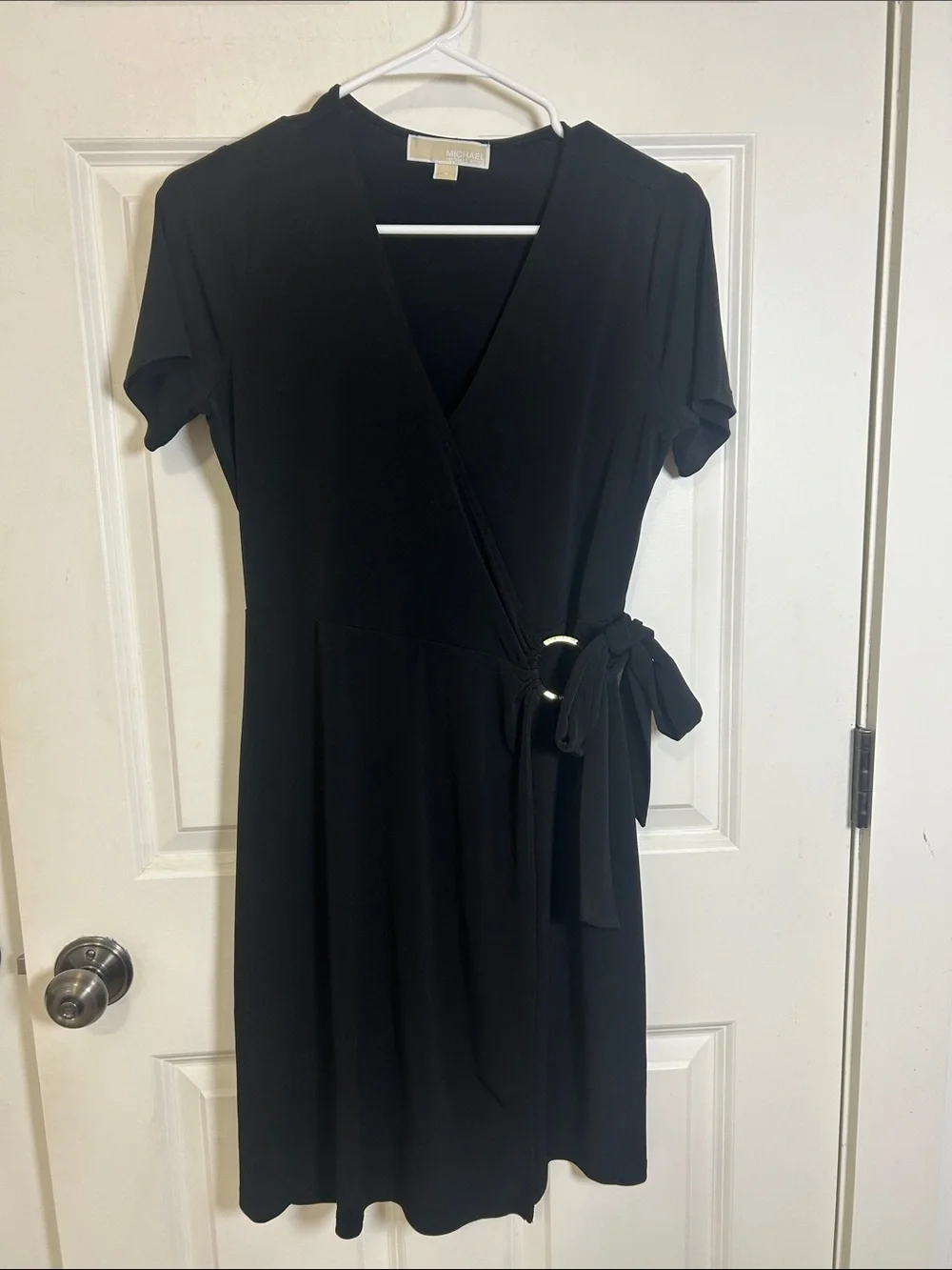 Michael Kors women’s short sleeve wrapped dress size small black with gold ring